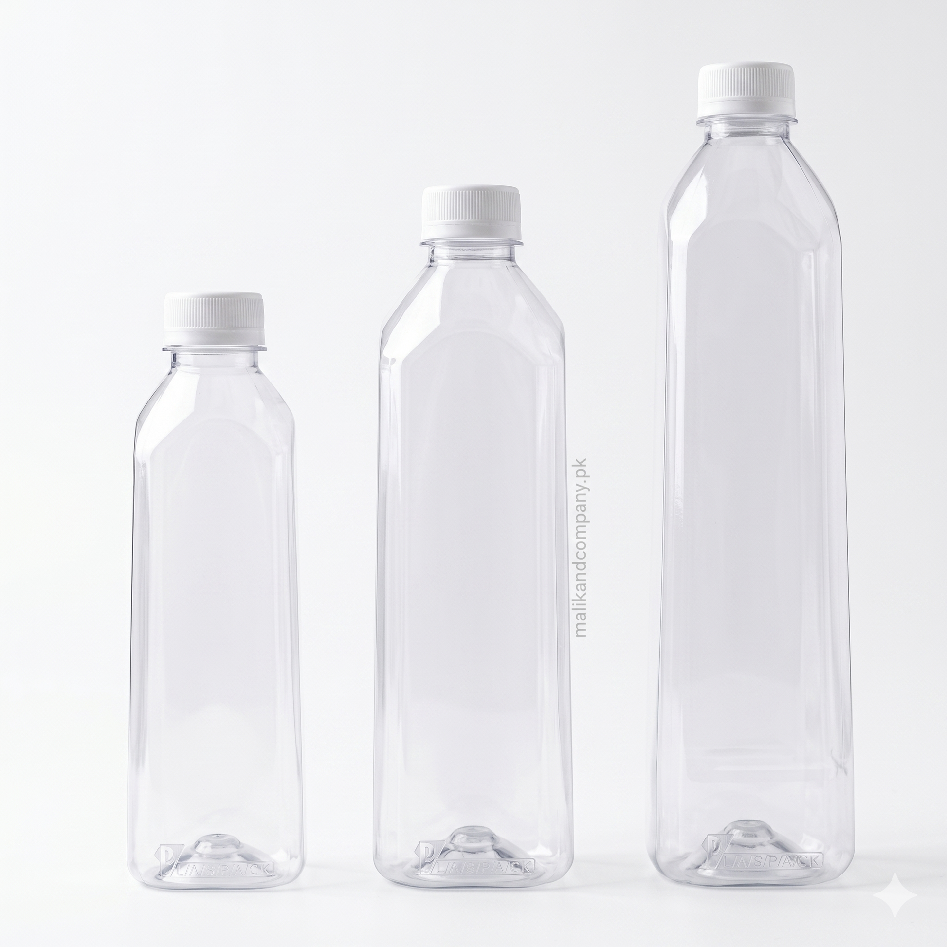 A lineup of three empty, clear PET plastic bottles with black caps, including a 250ml, a 500ml, and a 1000ml (1 liter) bottle, showing the full wholesale packaging range.