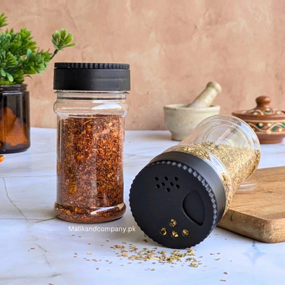 Shaker spice jars filled with chilli flakes and herbs — PET masala bottles, Pakistan